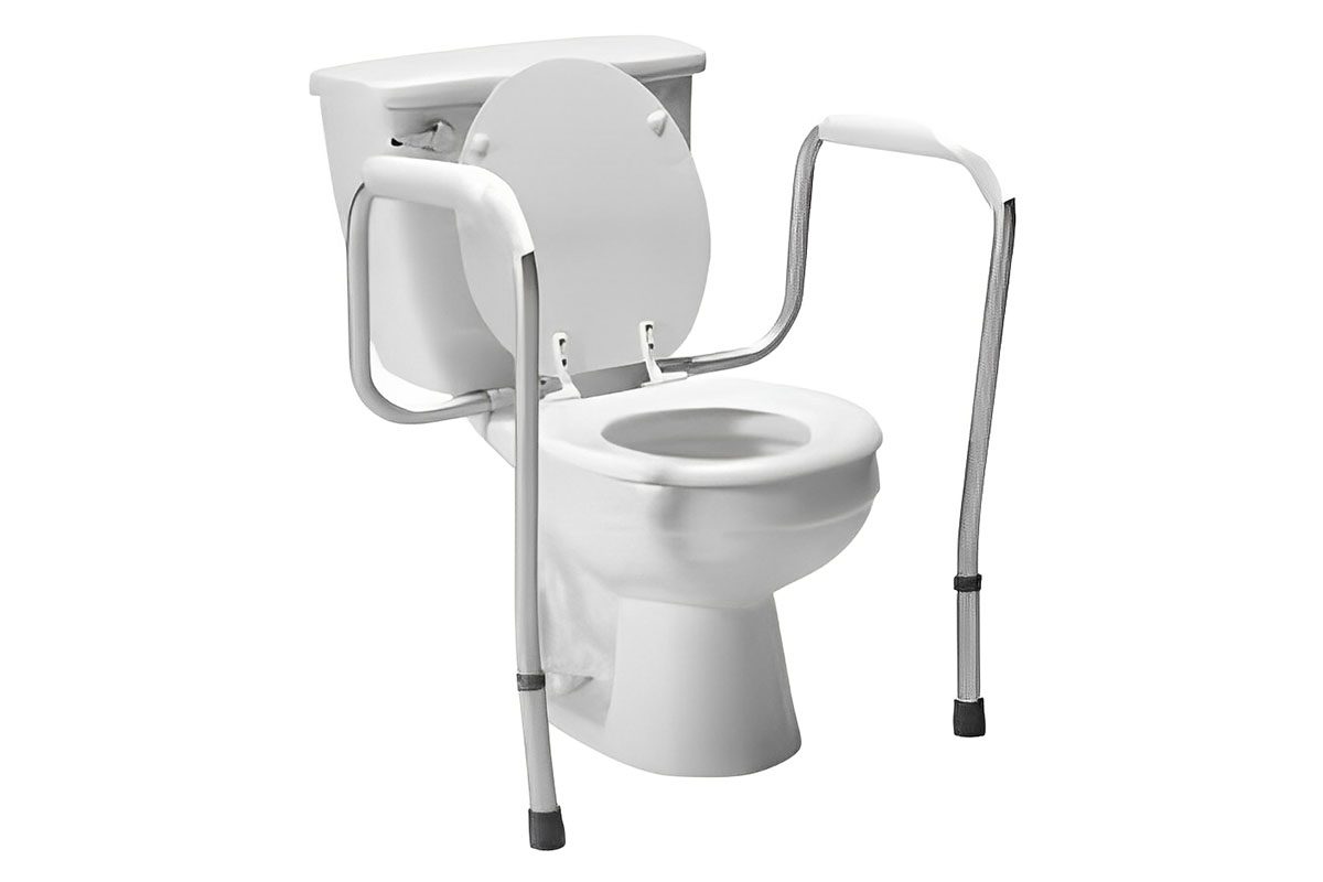 White toilet with a raised seat and detachable safety rails for accessibility.