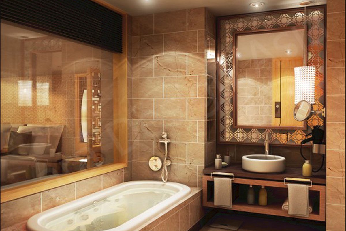 Luxurious bathroom with a large tiled bathtub, a wall mirror above a wooden vanity, and modern lighting. The room features beige and brown tones with various toiletries placed neatly.